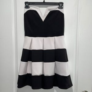 Women’s L black & white v-neck cocktail dress from Charlotte Russe.